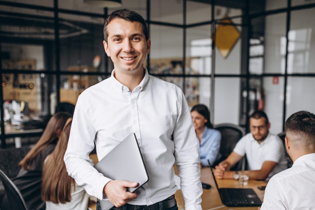Group of people working out business plan in an office